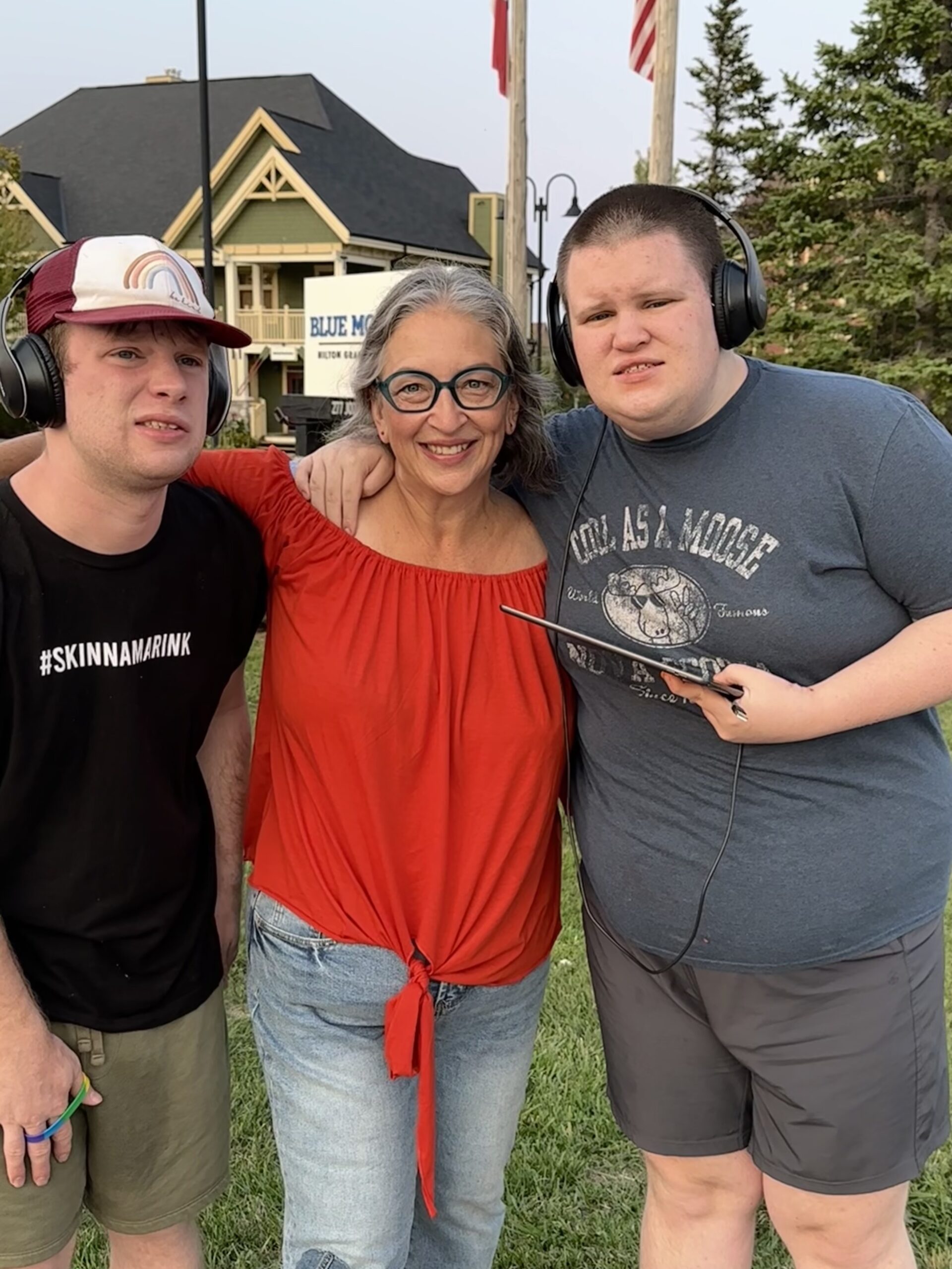 Stacey with twins wearing orange shirt